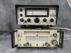 AN EDDYSTONE MODEL 1002/1 FM RADIO RECEIVER TOGETHER WITH A TELFORD COMMUNICATIONS TC7 MK2 RADIO