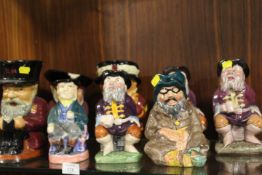 A COLLECTION OF ASSORTED TOBY JUGS