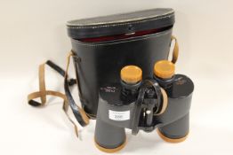 A CASED SET OF TECNAR 7 X 50 372FT AT 1000 YARDS COATED OPTIC BINOCULARS