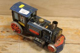 A VINTAGE TIN PLATE STEAM ENGINE