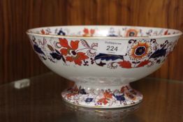 AN ANTIQUE ASHWORTH IMARI FOOTED BOWL