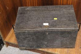 A VINTAGE WOODEN CHEST TOGETHER WITH A WICKER CASED BOTTLE
