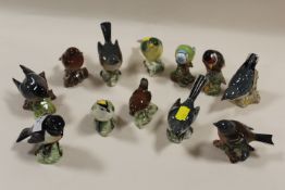 A COLLECTION OF BESWICK AND OTHER CERAMIC BIRDS