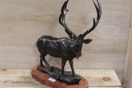 ***A CAST FIGURE OF A STAG ON A WOODEN BASE**