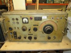 A LARGE STEEL CASED MILITARY FIELD RADIO RECEPTION SET R 107