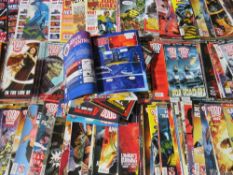 TWO BOXES OF 2000AD COMICS FEATURING JUDGE DREDD, FROM THE EARLY 2000'S