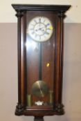 AN ANTIQUE VIENNA WALLCLOCK WITH TWIN WEIGHTS H-93 CM