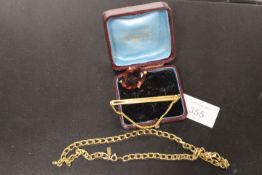 A VINTAGE AMETHYST BROOCH TOGETHER WITH A GOLD PLATED NECKLACE ETC