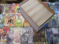 TWO BOXES OF 2000AD COMICS FEATURING JUDGE DREDD, FROM MIXED ERAS TO INCLUDE 1985, 1991 AND 2020