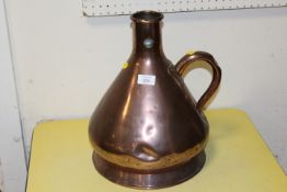 A LARGE COPPER VESSEL