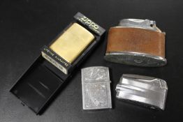 FOUR COLLECTABLE CIGARETTE LIGHTERS TO INCLUDE A ZIPPO EXAMPLE