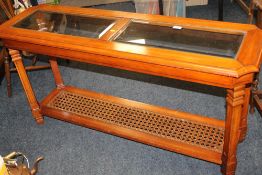 A MODERN BERGERE CONSOLE TABLE, NEST OF TABLE AND A TABLE