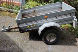 A SMALL TWO WHEEL CAR TRAILER