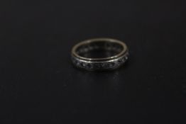 AN UNMARKED ETERNITY RING