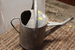 A VINTAGE GALVANIZED WATERING CAN