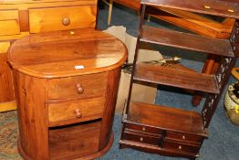 A MODERN HARDWOOD OVAL TABLE WITH DRAWERS AND A MODERN BOOKCASE (2)
