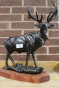***A CAST FIGURE OF A STAG ON A WOODEN BASE**
