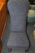 AN UPHOLSTERED EDWARDIAN PRAYER CHAIR