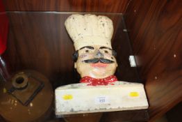 A VINTAGE CAST METAL ADVERTISING SIGN FOR A BAKERY