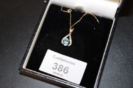 HALLMARKED 9CT GOLD AQUAMARINE AND DIAMOND PENDANT NECKLACE