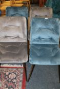 A SET OF FOUR MODERN HARLEQUIN UPHOLSTERED DINING CHAIRS