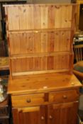 A SMALL HONEY PINE DRESSER