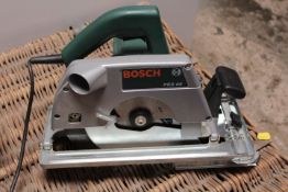 A BOXED BOSCH CIRCULAR SAW