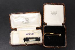 A 9C GOLD STOCK PIN APPROX 4,5G TOGETHER WITH A WHITBY JET BROOCH ( BOTH IN VINTAGE BOXES )