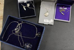 FIVE SILVER PENDANT NECKLACES
