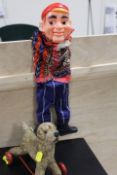 A VINTAGE TOY PUSH A LONG DOG TOGETHER WITH A VENTRILOQUISTS DUMMY (2)