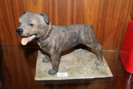 A RESIN STYLE FIGURE OF A STAFFORDSHIRE BULL TERRIER