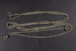A VICTORIAN WHITE METAL MUFF / LONG CHAIN
