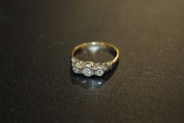 A 18CT THREE STONE ILLUSION SET DIAMOND RING APPROX 2.2G