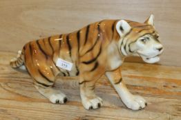 A LARGE ROYAL DUX CERAMIC PROWLING TIGER