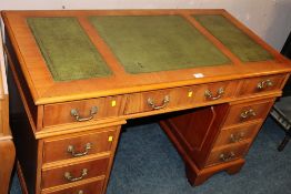 A MODERN TWIN PEDESTAL LEATHER TOPPED DESK W-123 CM