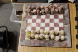 A SMALL MARBLE STYLE CHESS SET