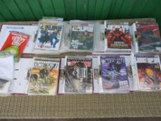 A BOX CONTAINING 8 FOLDERS OF 2000AD JUDGE DREDD COMICS FROM 2004 TO 2009