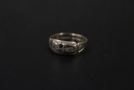 A HALLMARKED 9 CARAT GOLD RUBY AND DIAMOND DRESS RING APPROX 1.9G