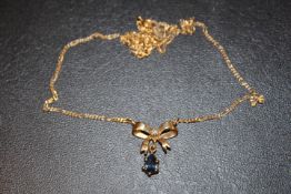 HALLMARKED 9CT GOLD TANZANITE AND DIAMOND SET PENDANT NECKLACE