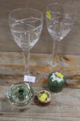 A PAIR OF STUART CRYSTAL JASPER CONRAN WINE GLASSES TOGETHER WITH A GLASS PAPERWEIGHT AND TWO ENAMEL