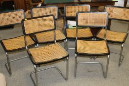 A SET OF SIX RETRO BERGERE DINING CHAIRS