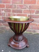 AN EDWARDIAN MAHOGANY INLAID JARDINIERE STAND, with swing handle, H 44 cm