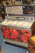 A WURLITZER 'SUPER STAR' JUKEBOX, complete with records, W 102 cm