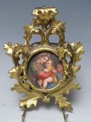 AFTER RAPHAEL - A 19TH CENTURY CONTINENTAL CIRCULAR PORCELAIN PLAQUE OF THE MADONNA & CHILD,