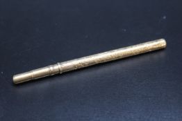 SAMPSON MORDAN - A YELLOW METAL COMBINATION DIP PEN AND PENCIL, having four chamber lead holder