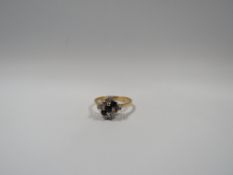 AN 18CT GOLD SAPPHIRE AND DIAMOND DRESS RING, the central row of three sapphires flanked by three