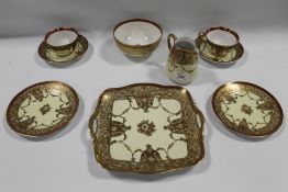 A COLLECTION OF NORITAKE CERAMICS, comprising a sandwich plate, cream jug, sugar bowl and two