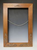 A DECORATIVE WOODEN PERIOD ART NOUVEAU FRAME, frame W 7.5 cm, rebate 60 x 36 cm