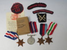 A GROUP OF WWII CASUALTY MEDALS FOR Tpr F.H. JAY, together with a WWII Commando Signals cloth