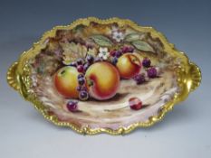 A ROYAL WORCESTER OVAL HAND PAINTED FRUIT STUDY, signed D. Winter, W 30 cm